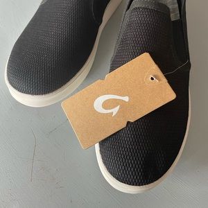 Woman’s Olukai KI’HELE Black shoe